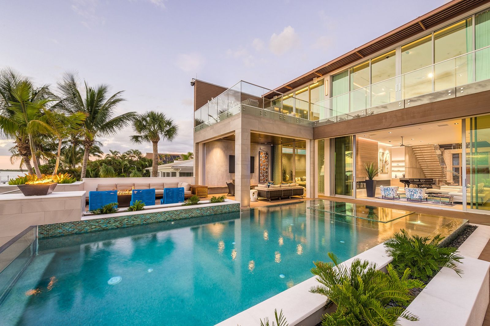 Bay House pool and open living room at dusk