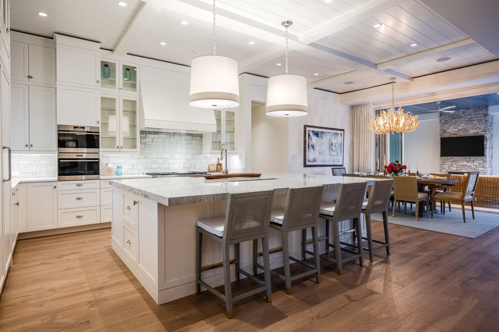 Kitchen with white millwork and island