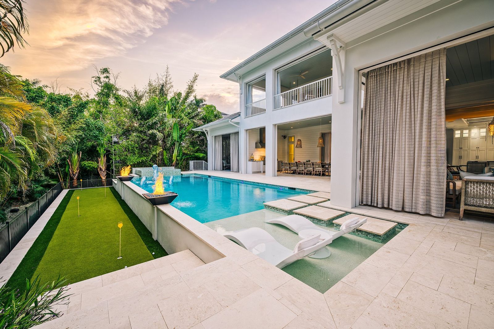 South of Hampton pool with sun shelf and loggia at sunset