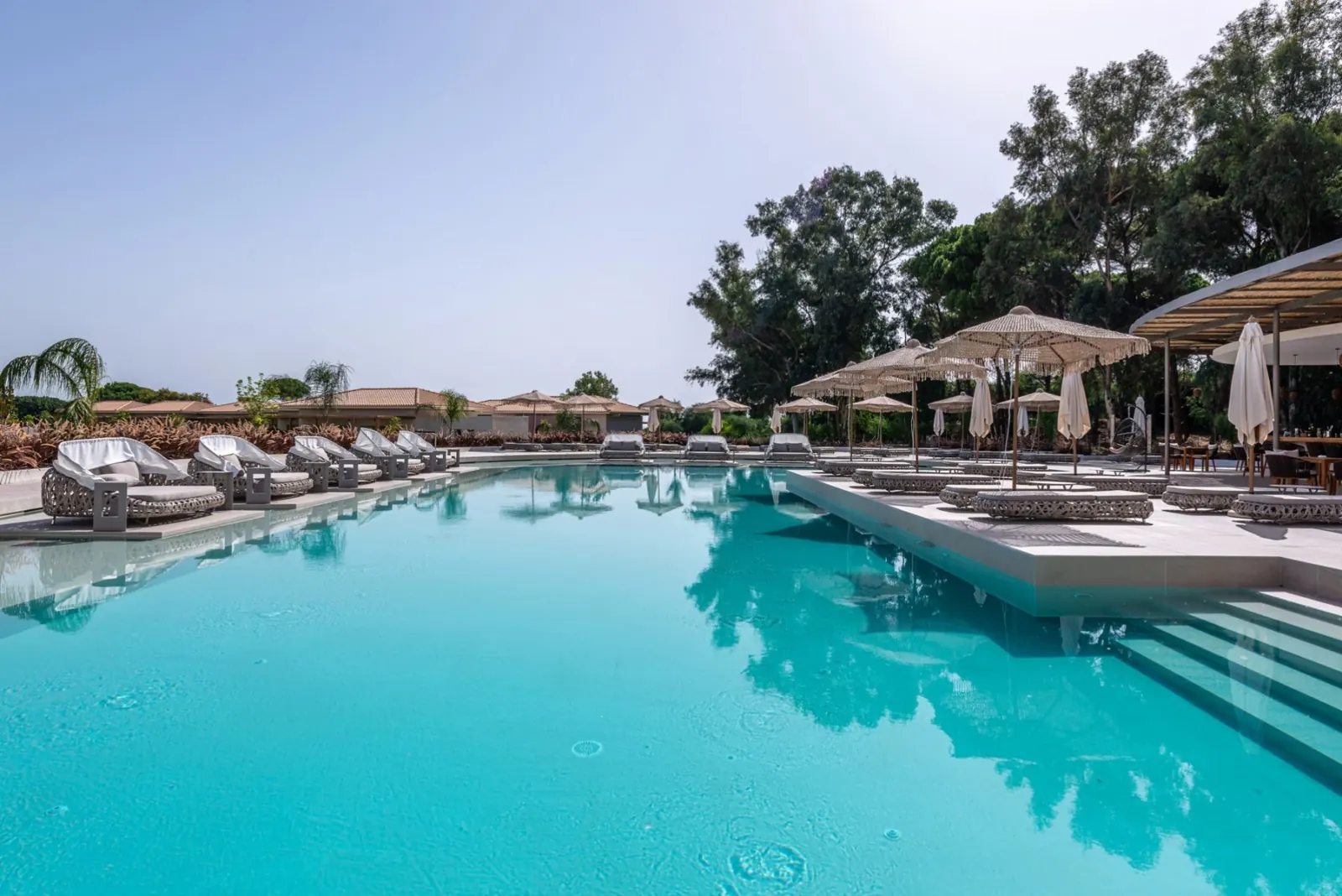 The main pool with loungers and parasols